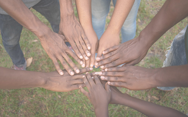 Hands joined together in support